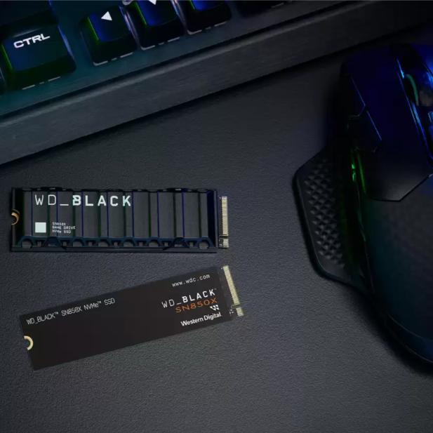 WD WDS800T2X0E PCIe Gen4 SSD with computer keyboard and mouse in the background